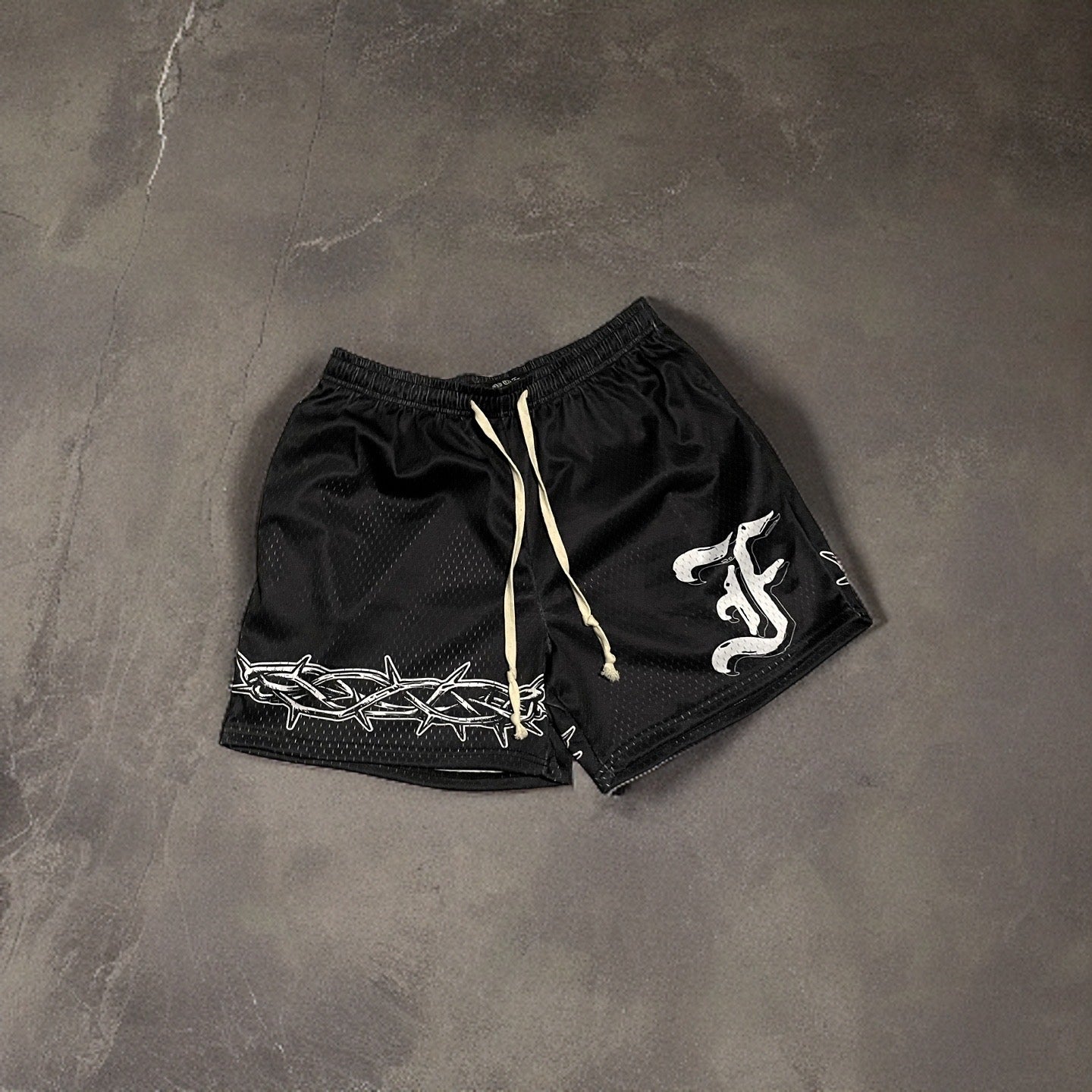 ‘CROWN OF THORNS’ MESH SHORTS - BLACK